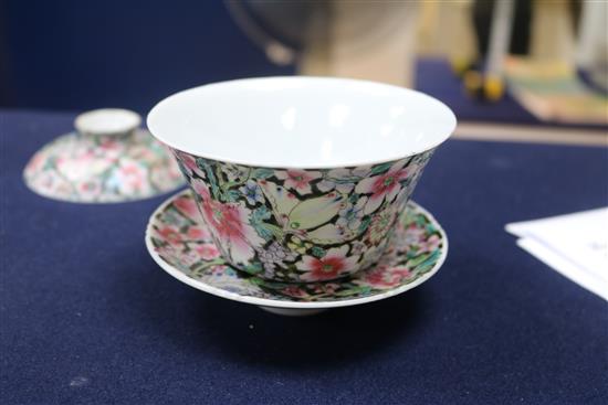 A Chinese ruby ground famille rose dish, early 20th century and a rice bowl, cover and stand
